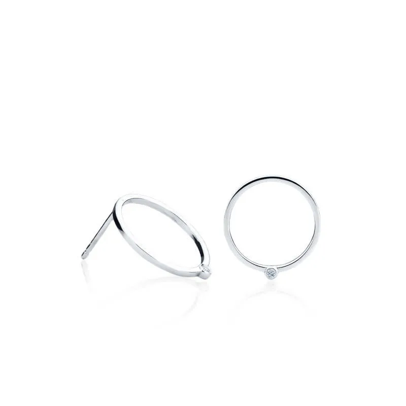 Boucles d'oreilles grosses solis à diamants en or blanc 18kt