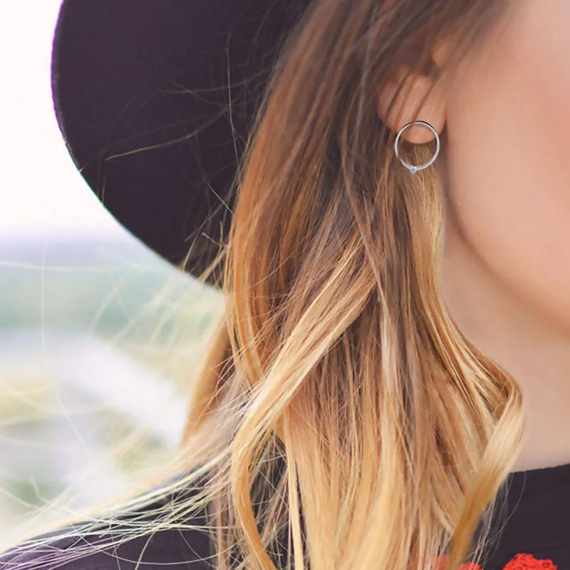 Boucles d'oreilles grosses solis à diamants en or blanc 18kt