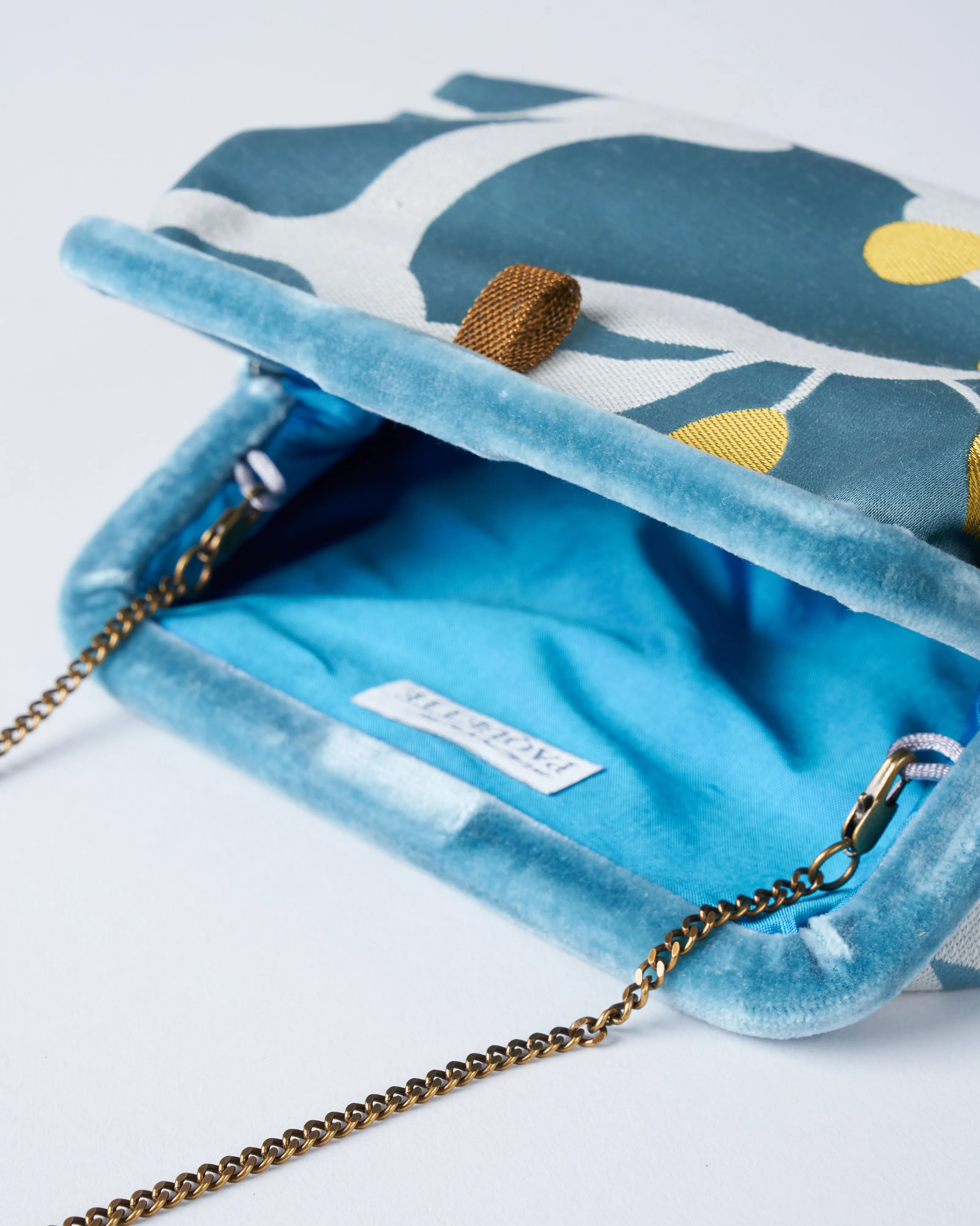 liette woven clutch - aqua/white/mustard