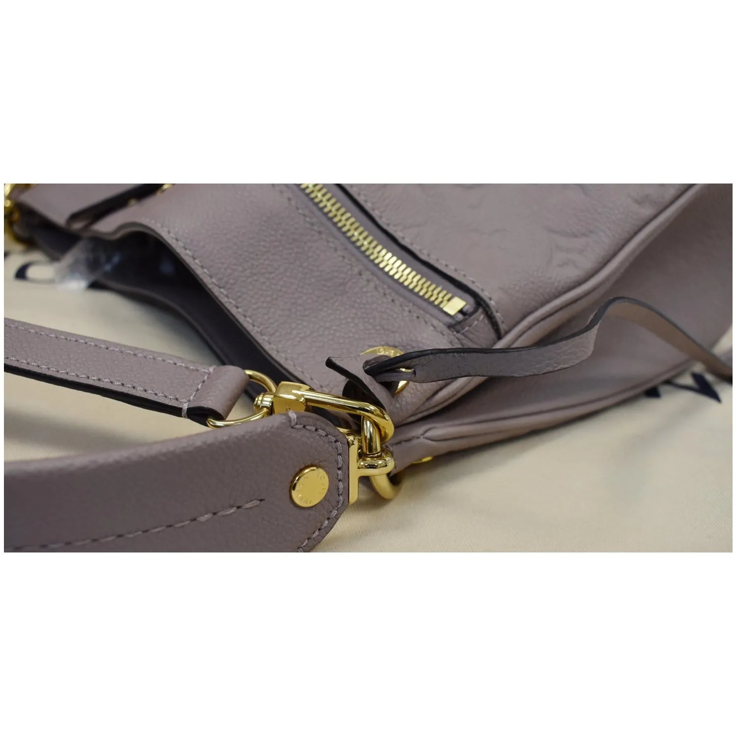 LOUIS VUITTON Spontini Empreinte Leather Shoulder Bag Mastic
