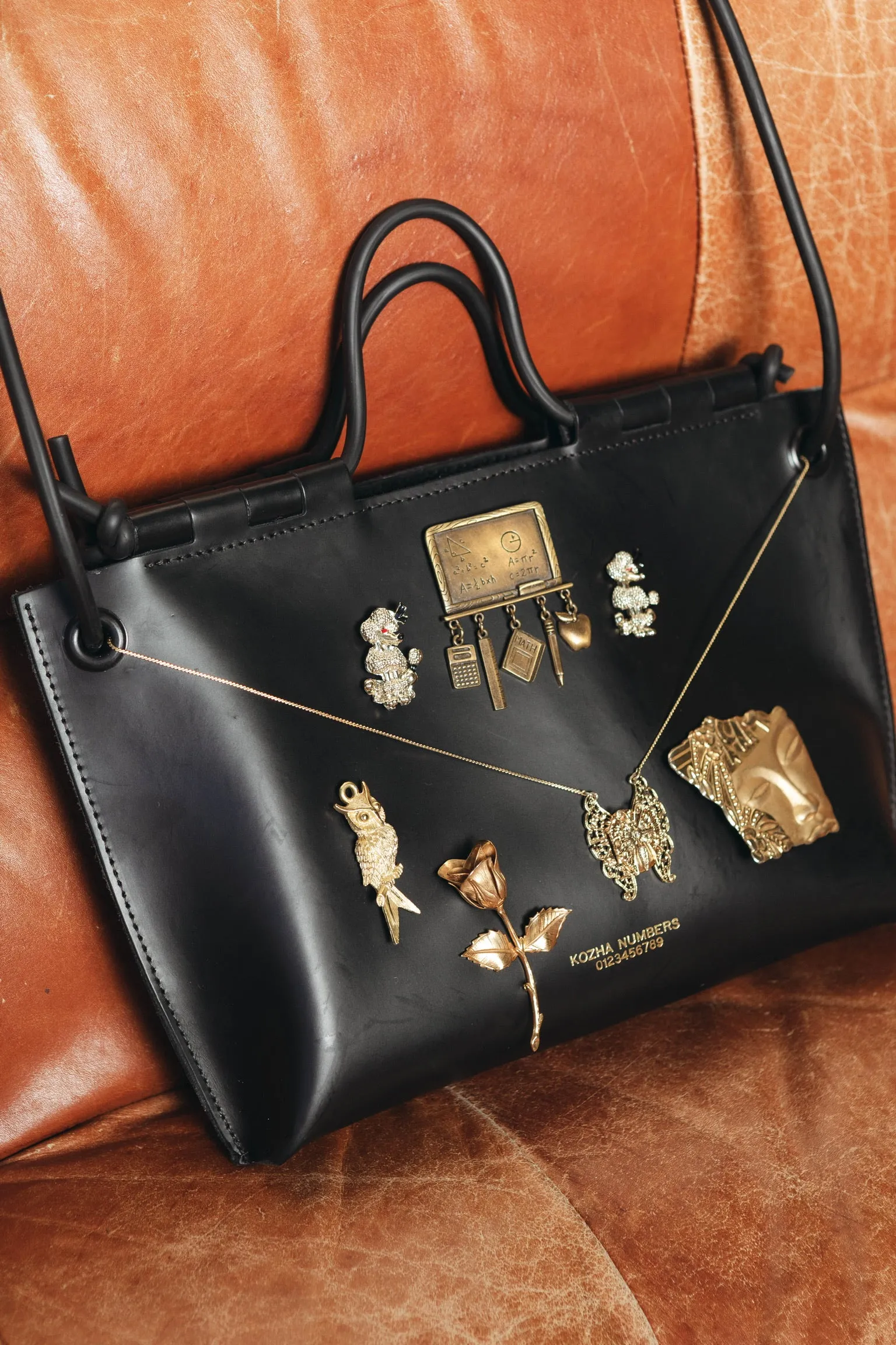 ONE OF ONE - SCHOLARS BOOK BAG - GRANDE SIESTA