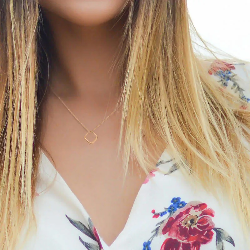 Pendentif quadra en or rose 18kt sur chaine 18 pouces