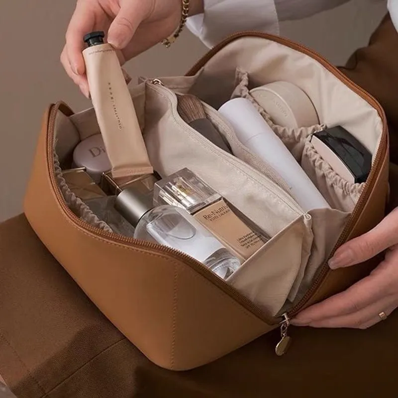 (🔥Schlussverkauf🔥)Tragbare Reisekosmetiktasche aus Leder